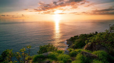 Fototapeta na wymiar Beautiful light of nature sunset or sunrise sky over mountain Beautiful tropical sea landscape.