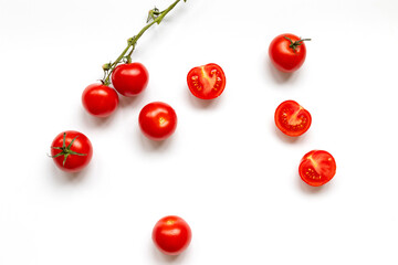 Fresh cherry tomatoes with water drop isolated on white background, top view, flat lay