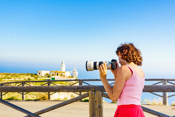 Tourist take photo at lighthouse, Cabo de Gata, Spain