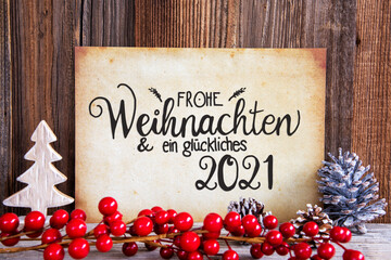 Fototapeta na wymiar Paper With German Text Frohe Weihnachten Und Ein Glueckliches 2020 Means Merry Christmas And A Happy 2021 Christmas Decoration And Wooden Background
