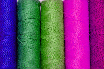 Multicolor sewing thread roll background