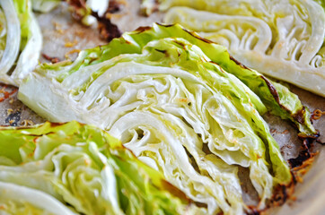 Obraz premium Baked young cabbage on baking paper
