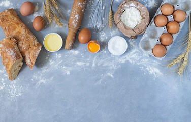 Ingredients for homemade bread and baking tools top view with space for text