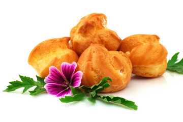 Eclair, custard, cake, profiterole with violet flower. Isolated on white background.