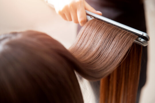 Concept lamination, lifting. Keratin recovery hair and protein treatment pile with professional ultrasonic iron tool