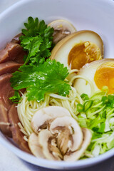 Japanese ramen soup with veal, egg, chives  - traditional Asian dish