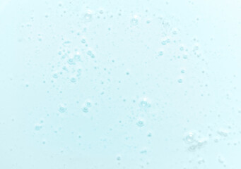 Transparent blue gel close-up, background of cosmetics, copy of the space