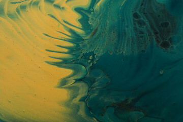 art photography of abstract marbleized effect background. Gold and balck, green creative colors. Beautiful paint.