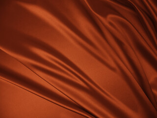 Beautiful smooth elegant wavy brown satin silk luxury cloth fabric texture, abstract background design. Copy space.