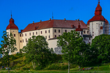Fototapeta na wymiar Lidkoping, Sweden The medieval Lacko Castle on the southern shore of Lake Vanern