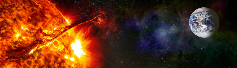 Fototapeta na wymiar The Sun activity in outer space with planet Earth. Elements of this image furnished by NASA.