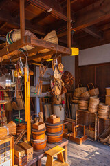 The store in the Edo Tokyo Architecture Museum has an indoor view, mostly made of wood.