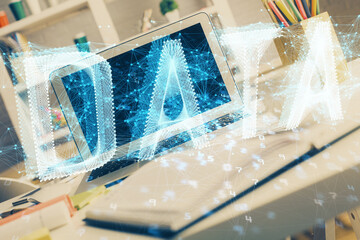 Double exposure of desktop with personal computer on background and tech theme drawing. Concept of data analysis.