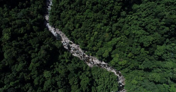 Aerial view waterfall with rocky on tropical rainforest cascade river nature landscape