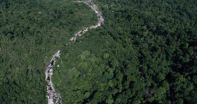 Aerial view waterfall in deep tropical forest mountain green tree