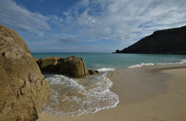 Porthcurno Beach Cornwall at sunset
