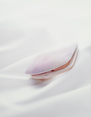 Cosmetic face powder on White cloth  background