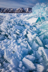 Fototapeta na wymiar Huge beautiful snowflakes on the ice of Lake Baikal