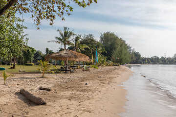 Beach Umbrella and Sunbed, Koh Mak Beach, Koh Mak island, Thailand.