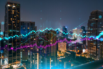 Obraz na płótnie Canvas FOREX graph hologram, aerial night panoramic cityscape of Bangkok, the developed location for stock market researchers in Asia. The concept of fundamental analysis. Double exposure.