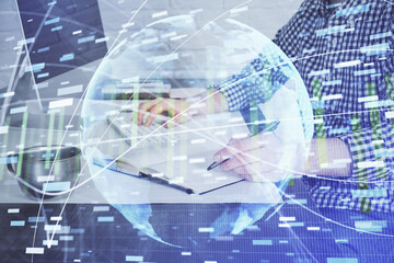 Multi exposure of businessman working on laptop on background. International business hologram in front. Concept of success.