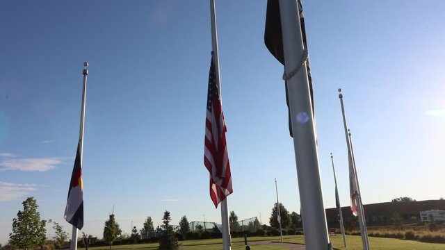 Colorado freedom memorial flags.  Sun flare.