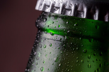 Wet beer bottle with a cap
