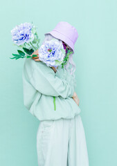 Blooming flowers Girl. Aqua menthe colours monochrome trends. Fashion concept ideal for bloggers, websites, magazines, business owners