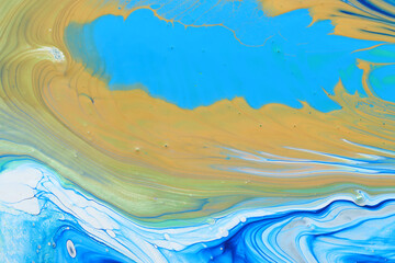 art photography of abstract marbleized effect background. Blue, white and gold creative colors. Beautiful paint.