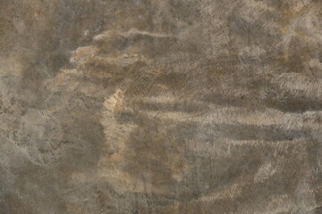 fondo abstracto con manchas grises sobre suelo de cemento