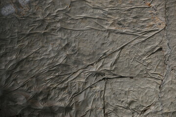 fondo abstracto con manchas grises sobre suelo de cemento