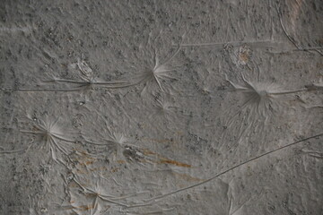 fondo abstracto con manchas grises sobre suelo de cemento