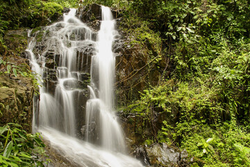 Obraz premium Ton Sai Waterfall in National Park Khao phra thaeo, Phuket, Thailand, Asia
