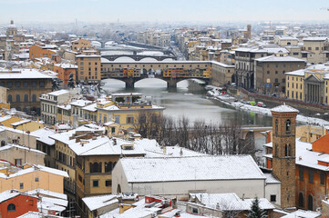 Fototapeta na wymiar Ponte Vecchio or Old Bridge Florence Italy with snow panorama Tuscany.