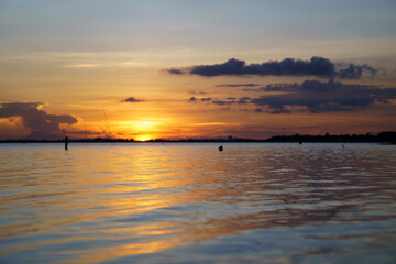 Fototapeta na wymiar beautiful sunset sky at the lake