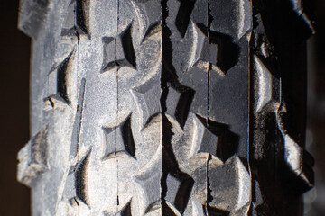 tread on a bicycle off-road tire, background, macro
