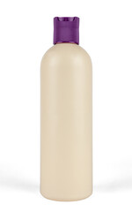 Beige plastic bottle with violet color lid isolated on white background