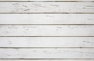 Obraz na płótnie Canvas Weathered white wooden background texture. Top view surface of the table.