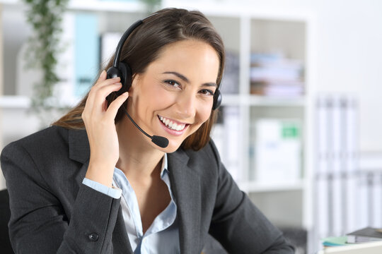 Happy Telemarketer Posing Looking Camera At Office