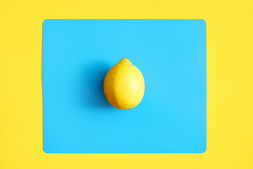 lemon on a blue background. creative design concept