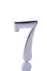 Silver metal number seven on white background