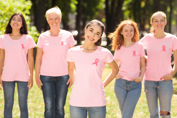 Indian Volunteer Girl Standing With Oncology Support Group In Park