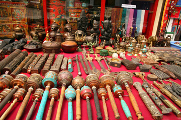 Tibetan praying objects for sale at a souvenir shop in Ladakh, India.