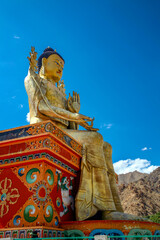 The Statue of Maitreya at Likir Monastery against clear blue sky, Leh, Ladakh, Kashmir, India.