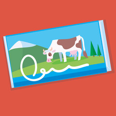 packing milk chocolate with a cow on a meadow in the mountains