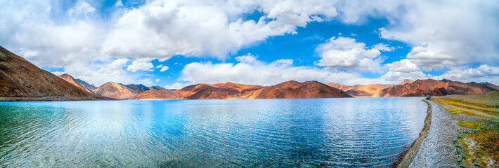 Landscape with reflections of the mountains on the lake named Pagong Tso, situated on the border with India and China.