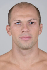 Obraz premium Face of young handsome muscular bald man shirtless
