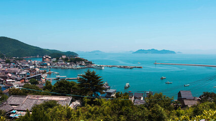 Fototapeta na wymiar Tomonoura Port town and Seto Inland Sea landscape view. Fukuyama, Hiroshima Prefecture, Japan. 