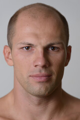 Obraz premium Face of young handsome muscular bald man shirtless