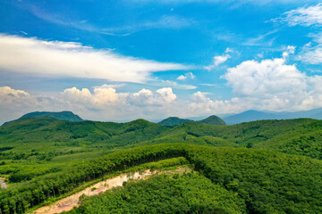 Naklejka na ściany i meble Aerial View of beautiful green mountains of southern Thailand